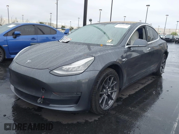 2018 Tesla Model 3 Long Range Battery with VIN 5YJ3E1EB1JF149423, listed as a IAAI auction lot 41896090 with 158,787 mi miles and . Bid and sale history available at DreamBid. Image 20.