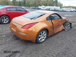2003 Nissan 350Z Touring z VIN JN1AZ34E73T003839, wystawiony jako IAAI lot #42206083 z przebiegiem 50 919 mil mil oraz . Historia ofert i sprzedaży dostępna na DreamBid. Obrazek 4.