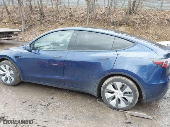 2022 Tesla Model Y Long Range with VIN 7SAYGDEE2NF421448, listed as a IAAI auction lot 41619301 with 44,562 mi miles. Bid and sale history available at carsss.com. Image 14.