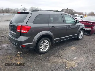 2017 Dodge Journey SXT with VIN 3C4PDCBB1HT612273, listed as a IAAI auction lot 41664445 with 122,069 mi miles and . Bid and sale history available at DreamBid. Image 4.