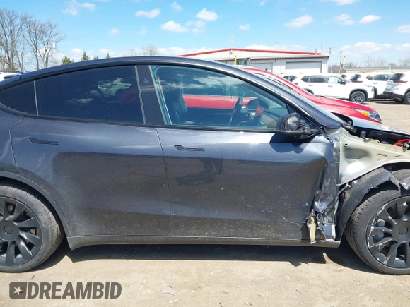 2024 Tesla Model Y Long Range with VIN 7SAYGAEE4RF078906, listed as a IAAI auction lot 42051207 with Not Provided miles and . Bid and sale history available at DreamBid. Image 12.