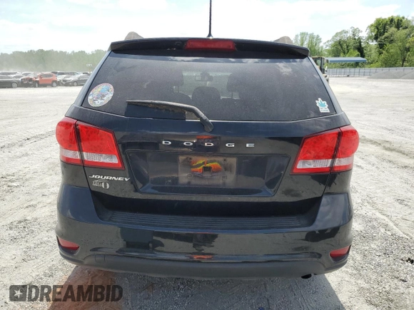 2019 Dodge Journey SE with VIN 3C4PDCBB1KT779370, listed as a Copart auction lot 53846695 with 63,623 mi miles and Salvage Title. Bid and sale history available at DreamBid. Image 6.