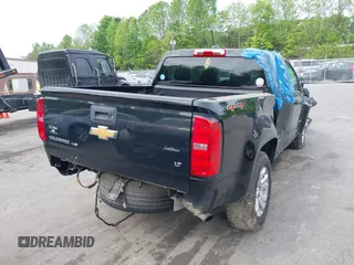 2020 Chevrolet Colorado 4WD LT with VIN 1GCGTCEN6L1189568, listed as a IAAI auction lot 42097979 with 64,919 mi miles and . Bid and sale history available at DreamBid. Image 4.