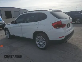 2015 BMW X1 sDrive28i with VIN WBAVM1C50FV498720, listed as a Copart auction lot 80381264 with 0 mi miles and Salvage Title. Bid and sale history available at carsss.com. Image 2.