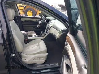 2014 Cadillac SRX Performance Collection with VIN 3GYFNCE31ES683465, listed as a IAAI auction lot 42107705 with 117,285 mi miles. Bid and sale history available at carsss.com. Image 5.
