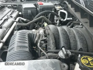 2021 GMC Sierra 1500 Denali with VIN 1GTU9FEL2MZ306258, listed as a IAAI auction lot 42427084 with 106,698 mi miles and . Bid and sale history available at DreamBid. Image 19.
