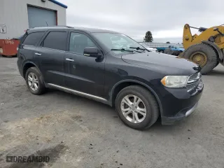 2013 Dodge Durango Crew with VIN 1C4SDJDTXDC565576, listed as a Copart auction lot 51575175 with 184,302 mi miles and Clean Title. Bid and sale history available at carsss.com. Image 4.