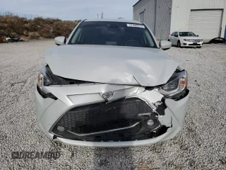 2019 Toyota Yaris L z VIN 3MYDLBYV3KY506033, wystawiony jako Copart lot #47498075 z przebiegiem 71 326 mil mil oraz Szkoda całkowita • Salvage title. Historia ofert i sprzedaży dostępna na DreamBid. Obrazek 5.