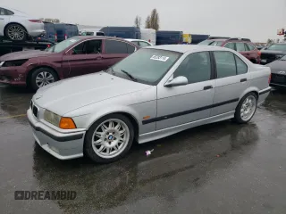 1997 BMW M3 with VIN WBSCD0321VEE10715, listed as a Copart auction lot 85293114 with 154,254 mi miles and Clean title. Bid and sale history available at DreamBid. Image 1.