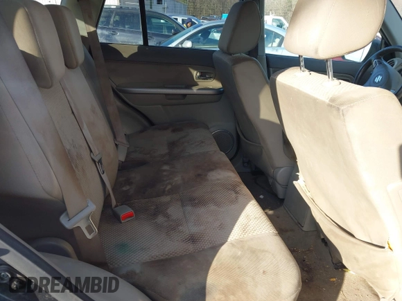 2010 Suzuki Grand Vitara with VIN JS3TE0D4XA4100453, listed as a IAAI auction lot 41603012 with 210,039 mi miles and . Bid and sale history available at DreamBid. Image 8.