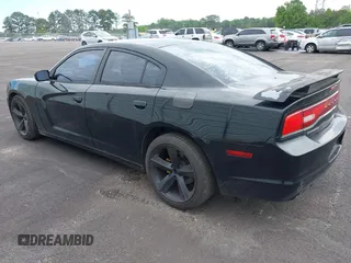 2013 Dodge Charger SE with VIN 2C3CDXBG9DH546130, listed as a IAAI auction lot 42209748 with 214,087 mi miles and . Bid and sale history available at DreamBid. Image 3.