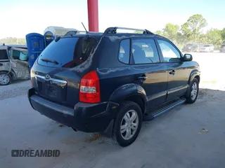 2007 Hyundai Tucson SE with VIN KM8JN12D07U475917, listed as a IAAI auction lot 41872876 with 172,006 mi miles. Bid and sale history available at carsss.com. Image 4.