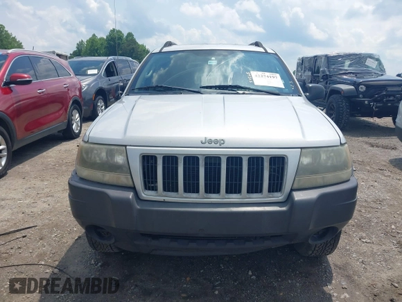 2004 Jeep Grand Cherokee Laredo with VIN 1J4GX48N04C435603, listed as a IAAI auction lot 42274197 with 256,163 mi miles and . Bid and sale history available at DreamBid. Image 12.