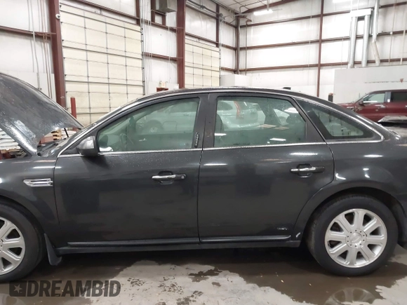 2008 Ford Taurus Limited with VIN 1FAHP28W08G141243, listed as a IAAI auction lot 41327967 with 157,482 mi miles. Bid and sale history available at carsss.com. Image 6.