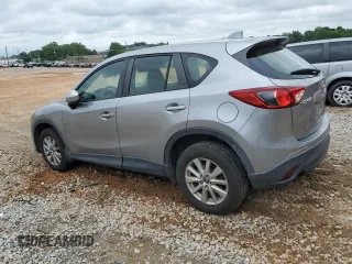 2015 Mazda CX-5 Sport z VIN JM3KE2BE4F0459532, wystawiony jako Copart lot #61049235 z przebiegiem 149 808 mil mil oraz Szkoda całkowita • Salvage title. Historia ofert i sprzedaży dostępna na DreamBid. Obrazek 2.