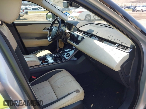 2020 Land Rover Range Rover Velar S z VIN SALYB2EX4LA242330, wystawiony jako IAAI lot #42479335 z przebiegiem 99 712 mil mil oraz . Historia ofert i sprzedaży dostępna na DreamBid. Obrazek 5.