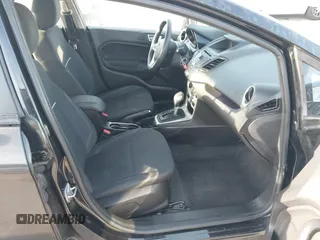 2014 Ford Fiesta SE with VIN 3FADP4BJ0EM139467, listed as a IAAI auction lot 41817437 with 45,570 mi miles and . Bid and sale history available at DreamBid. Image 5.