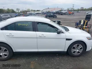 2016 Ford Sedan Police Interceptor with VIN 1FAHP2MK0GG116974, listed as a IAAI auction lot 42044185 with 161,699 mi miles. Bid and sale history available at carsss.com. Image 13.