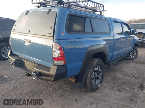 2015 Toyota Tacoma with VIN 3TMMU4FN7FM079866, listed as a IAAI auction lot 41618881 with 165,268 mi miles. Bid and sale history available at carsss.com. Image 4.