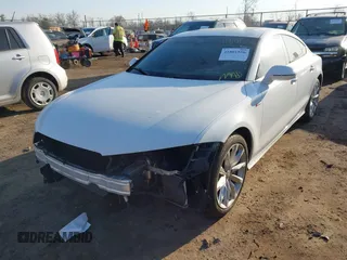 2013 Audi A7 3.0 Prestige with VIN WAU3GAFC6DN063674, listed as a IAAI auction lot 41801556 with 135,913 mi miles. Bid and sale history available at carsss.com. Image 2.
