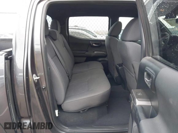 2018 Toyota Tacoma SR5 with VIN 3TMAZ5CN0JM061233, listed as a IAAI auction lot 41944668 with 94,314 mi miles and . Bid and sale history available at DreamBid. Image 8.