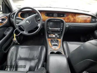 2007 Jaguar XJ with VIN SAJWA71B17SH14626, listed as a Copart auction lot 71013573 with 156,134 mi miles and Salvage Title. Bid and sale history available at carsss.com. Image 8.