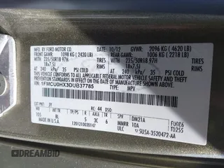 2013 Ford Escape SEL with VIN 1FMCU0HX3DUB37785, listed as a IAAI auction lot 41863069 with 179,508 mi miles. Bid and sale history available at carsss.com. Image 9.