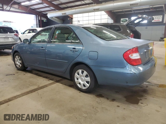 2004 Toyota Camry LE z VIN 4T1BE32K94U820825, wystawiony jako Copart lot #60972565 z przebiegiem 198 899 mil mil oraz Czysty tytuł • Clean title. Historia ofert i sprzedaży dostępna na DreamBid. Obrazek 2.