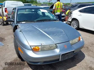 2002 Saturn SL z VIN 1G8ZK52732Z152274, wystawiony jako IAAI lot #42103737 z przebiegiem 56 781 mil mil oraz . Historia ofert i sprzedaży dostępna na DreamBid. Obrazek 6.