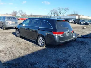 2016 Honda Odyssey SE with VIN 5FNRL5H34GB139571, listed as a IAAI auction lot 41602695 with 118,960 mi miles. Bid and sale history available at carsss.com. Image 3.