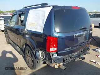 2011 Honda Pilot Touring with VIN 5FNYF4H92BB090056, listed as a IAAI auction lot 42010682 with 201,640 mi miles. Bid and sale history available at carsss.com. Image 3.