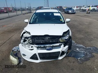 2012 Ford Focus SE with VIN 1FAHP3F20CL473141, listed as a IAAI auction lot 41776178 with 112,777 mi miles and . Bid and sale history available at DreamBid. Image 12.
