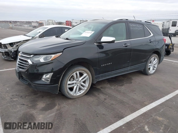 2021 Chevrolet Equinox Premier z VIN 2GNAXXEV4M6118442, wystawiony jako IAAI lot #41392148 z przebiegiem 92 170 mil mil oraz . Historia ofert i sprzedaży dostępna na DreamBid. Obrazek 18.
