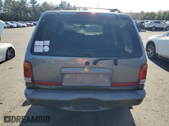 2000 Mercury Mountaineer z VIN 4M2DU86P0YUJ09470, wystawiony jako Copart lot #80207394 z przebiegiem 119 634 mil mil oraz Czysty tytuł • Clean title. Historia ofert i sprzedaży dostępna na DreamBid. Obrazek 6.