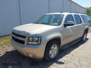 2012 Chevrolet Suburban LT with VIN 1GNSCJE03CR128206, listed as a IAAI auction lot 42002119 with 329,078 mi miles. Bid and sale history available at carsss.com. Image 2.