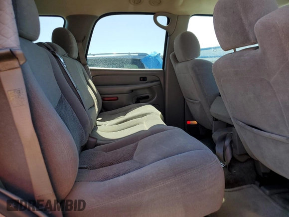 2005 Chevrolet Tahoe Z71 z VIN 1GNEC13T65R104656, wystawiony jako Copart lot #57705205 z przebiegiem 197 363 mil mil oraz Czysty tytuł • Clean title. Historia ofert i sprzedaży dostępna na DreamBid. Obrazek 11.