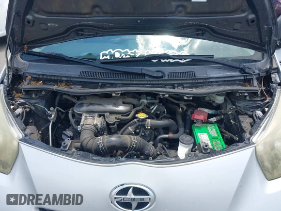 2013 Scion iQ with VIN JTNJJXB00DJ023345, listed as a IAAI auction lot 42631440 with 73,105 mi miles and . Bid and sale history available at DreamBid. Image 10.