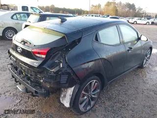 2019 Hyundai Veloster 2.0 Premium with VIN KMHTG6AF3KU013055, listed as a IAAI auction lot 41206611 with 48,759 mi miles. Bid and sale history available at carsss.com. Image 4.