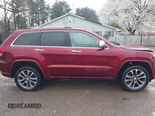 2017 Jeep Grand Cherokee Overland with VIN 1C4RJFCG5HC854024, listed as a IAAI auction lot 42006307 with 118,640 mi miles. Bid and sale history available at carsss.com. Image 14.