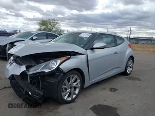 2017 Hyundai Veloster Value Edition with VIN KMHTC6AD2HU308084, listed as a IAAI auction lot 41734062 with 59,354 mi miles. Bid and sale history available at carsss.com. Image 2.