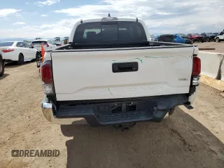 2022 Toyota Tacoma SR с VIN 3TMCZ5AN7NM454051, выставлен на аукционе Copart как лот 59896115 с пробегом 70 202 миль миль и Списание • Salvage title. История ставок и продаж доступна на DreamBid. Изображение 6.