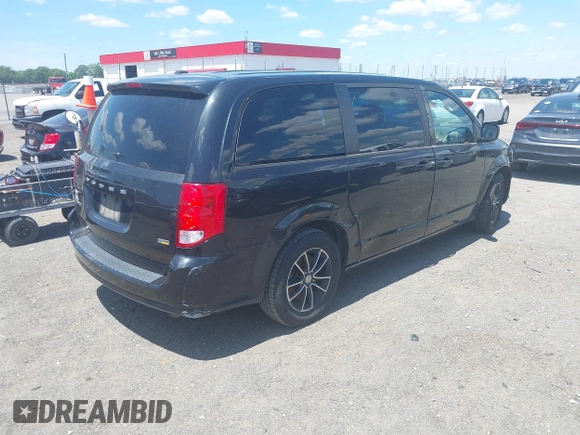 2018 Dodge Grand Caravan SE Plus with VIN 2C4RDGBG1JR198836, listed as a IAAI auction lot 42184601 with 95,576 mi miles and . Bid and sale history available at DreamBid. Image 4.
