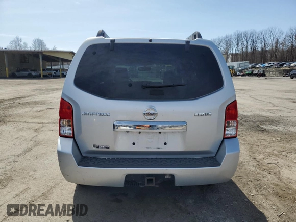 2011 Nissan Pathfinder LE z VIN 5N1AR1NB5BC623749, wystawiony jako Copart lot #51309485 z przebiegiem 199 545 mil mil oraz Szkoda całkowita • Salvage title. Historia ofert i sprzedaży dostępna na DreamBid. Obrazek 6.