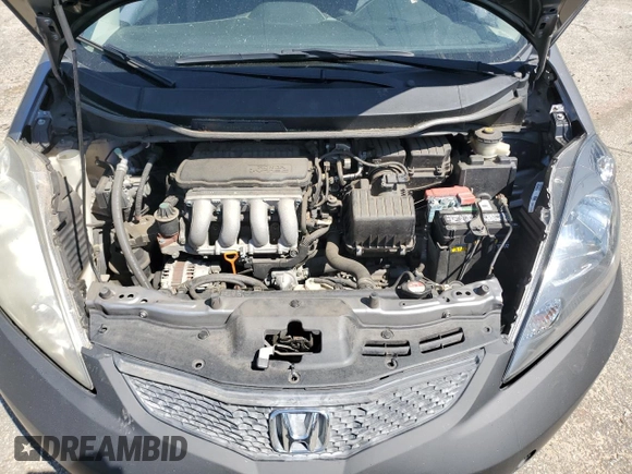 2009 Honda Fit Sport with VIN JHMGE88429S042773, listed as a Copart auction lot 50627005 with 107,570 mi miles and Salvage Title. Bid and sale history available at carsss.com. Image 11.