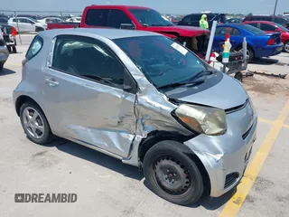 2012 Scion iQ with VIN JTNJJXB07CJ018562, listed as a IAAI auction lot 42404672 with 79,867 mi miles and . Bid and sale history available at DreamBid. Image 6.