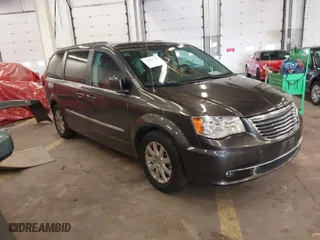 2016 Chrysler Town & Country Touring with VIN 2C4RC1BG0GR296393, listed as a IAAI auction lot 41560774 with 103,921 mi miles. Bid and sale history available at carsss.com. Image 1.