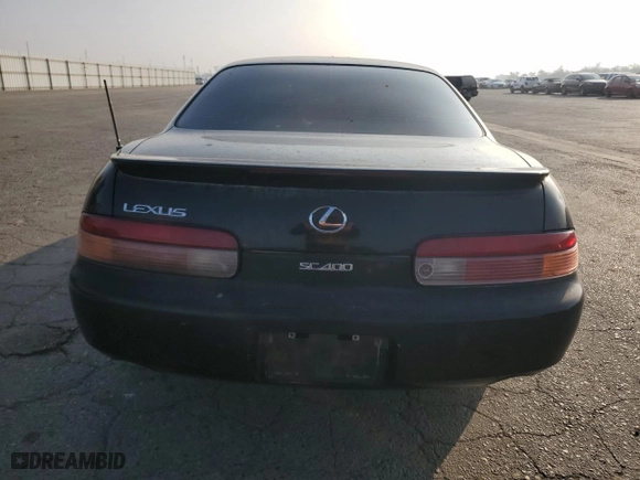 1995 Lexus SC 400 with VIN JT8UZ30C0S0048229, listed as a Copart auction lot 82745854 with NaN miles and Salvage Title. Bid and sale history available at carsss.com. Image 6.