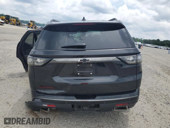 2021 Chevrolet Traverse Premier with VIN 1GNERKKW2MJ262862, listed as a Copart auction lot 58779765 with 76,927 mi miles and Salvage title. Bid and sale history available at DreamBid. Image 6.