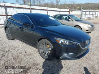 2016 Mazda Mazda6 i Grand Touring with VIN JM1GJ1W50G1478699, listed as a IAAI auction lot 41711211 with 208,720 mi miles. Bid and sale history available at carsss.com. Image 1.
