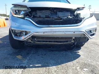 2015 Honda CR-V EX-L with VIN 2HKRM3H77FH508587, listed as a IAAI auction lot 41856580 with 62,854 mi miles. Bid and sale history available at carsss.com. Image 6.